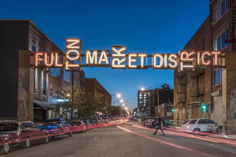 Photo of a neon banner at Fulton Market